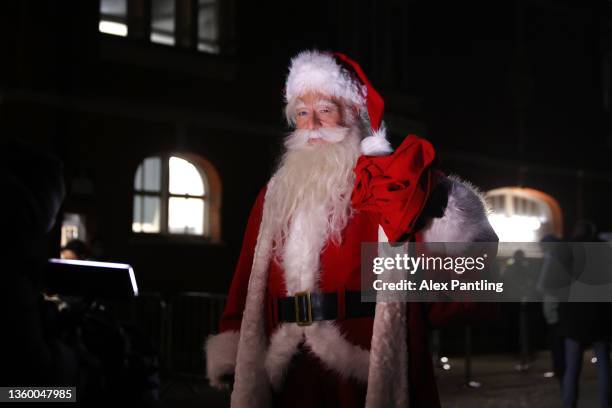 Man dressed as Santa Claus is pictured outside the stadium prior to the Sky Bet Championship match between Fulham and Sheffield United at Craven...