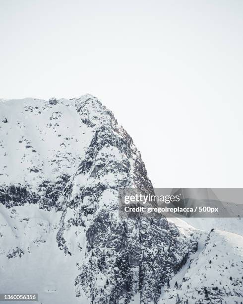 snow on mountain in la plagne by grgoire placca,la plagne,france - la plagne stockfoto's en -beelden