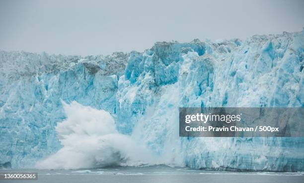 juneau alaska iceberg tour,scenic view of frozen sea against sky,juneau,alaska,united states,usa - glacier calving stock pictures, royalty-free photos & images