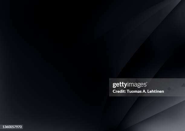 abstract, simple and modern wavy lines on dark gray and black background. - black gray background stock pictures, royalty-free photos & images