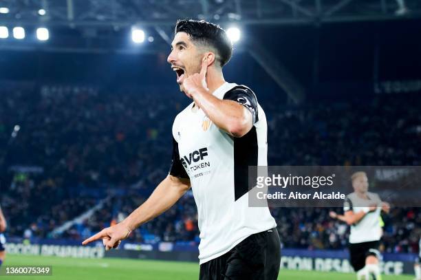 Carlos Soler of Valencia CF celebrates after scoring his team's third goal during the LaLiga Santander match between Levante UD and Valencia CF at...