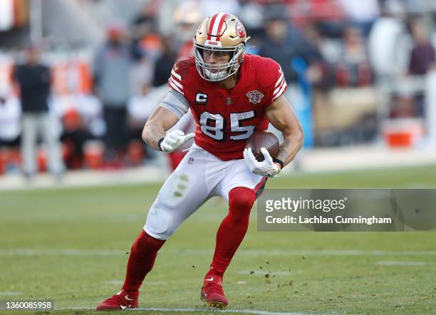 George Kittle of the San Francisco 49ers runs with the ball after a catch in the third quarter against the Atlanta Falcons at Levi's Stadium on...