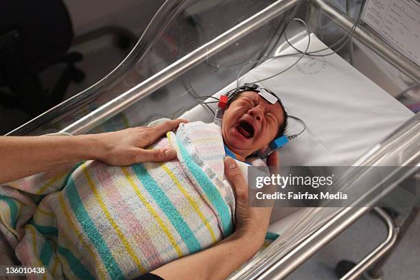 Kailanah Brent, two days old, undergoes a hearing test at John Hunter Children's Hospital in Newcastle. .