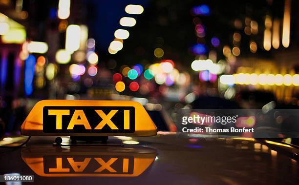 view of taxi board - taxi stock pictures, royalty-free photos & images