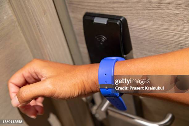 rfid bracelet. the rfid bracelet is a convenient replacement for electronic cards - rubber bracelet stock pictures, royalty-free photos & images