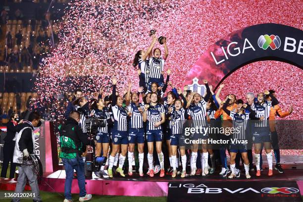 Players of Monterrey celebrate with the champion trophy after winning the final second leg match between Tigres UANL and Monterrey as part of the...