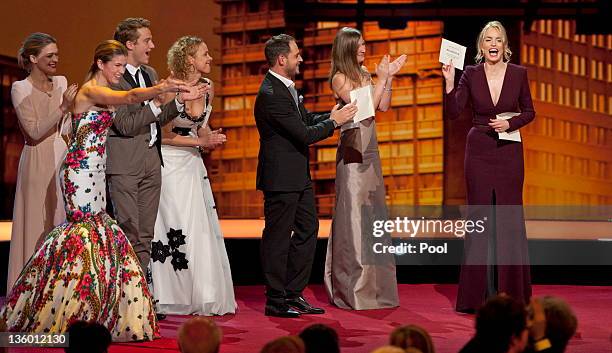 German actress Nina Hoss announces the name of 'Melancholia', a film by Danish director Lars von Trier, as the winner of 'European Film 2011' award...