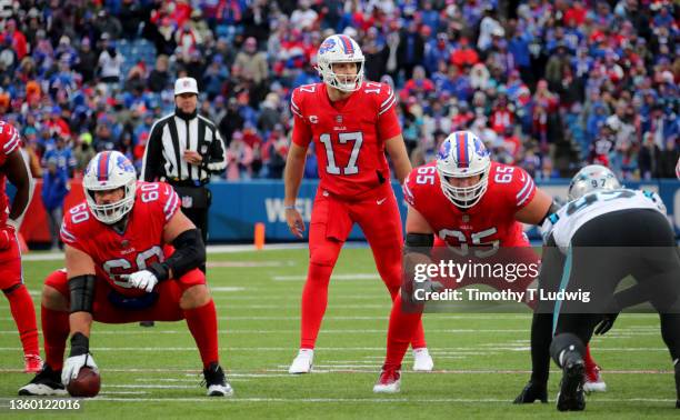 Josh Allen of the Buffalo Bills calls a play against the Carolina Panthers at Highmark Stadium on December 19, 2021 in Orchard Park, New York.