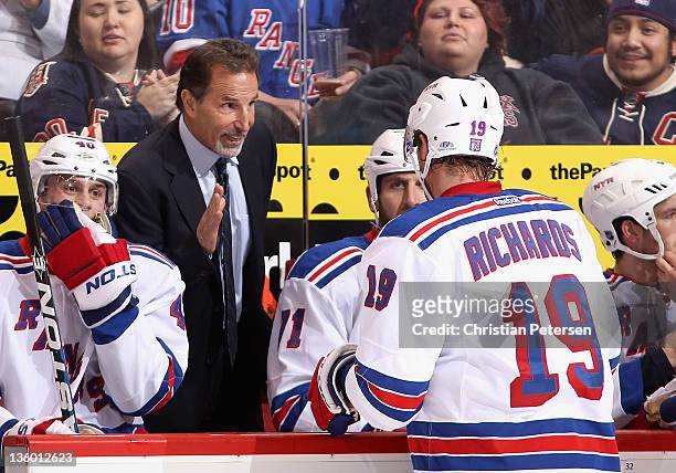 Head coach John Tortorella of the New York Rangers talks with Brad Richards during the NHL game against the Phoenix Coyotes at Jobing.com Arena on...