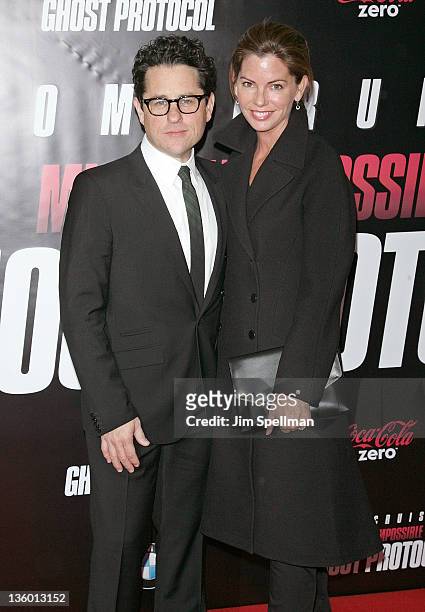 Producer J.J. Abrams and wife Katie McGrath attend the "Mission: Impossible - Ghost Protocol" U.S. Premiere at the Ziegfeld Theatre on December 19,...