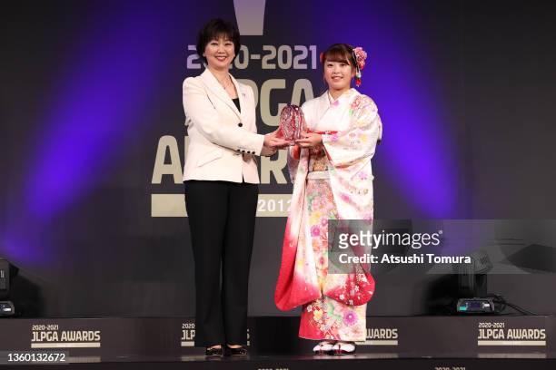 Chairman Hiromi Kobayashi of Japan and Mao Saigo of Japan pose for photographs at a photo session during the 2020-21 JLPGA Awards on December 21,...