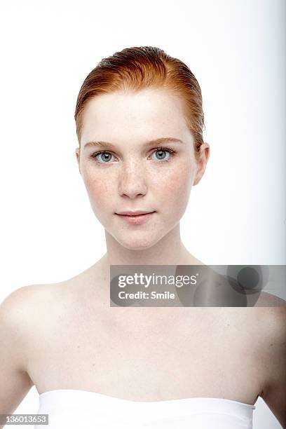 portrait of redhead girl with hair gelled back - hair back stock pictures, royalty-free photos & images