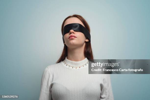 woman wearing blindfold - 3 wise monkeys stock pictures, royalty-free photos & images