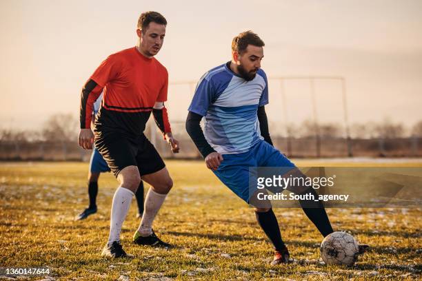 male soccer duel - fotbollsmästerskap bildbanksfoton och bilder
