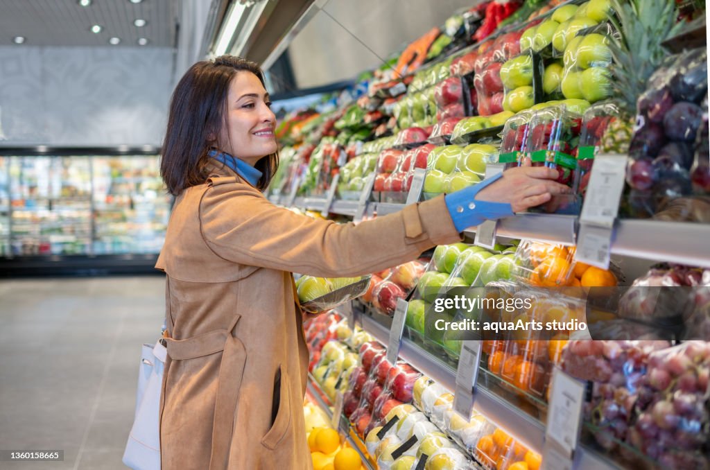 Shopping Fruits At Supermarket