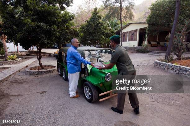 Jose Ramos-Horta, East Timor's president, left, prepares to drive to his office in Dili, East Timor, on Sunday, Oct. 3, 2011. East Timor, which...