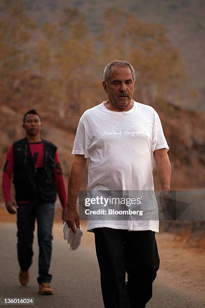 Jose Ramos-Horta, East Timor's president, front, does his daily morning powerwalk near Dili, East Timor, on Monday, Oct. 3, 2011. East Timor, which...