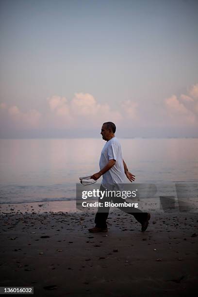 Jose Ramos-Horta, East Timor's president, does his daily morning powerwalk near Dili, East Timor, on Monday, Oct. 3, 2011. East Timor, which became a...