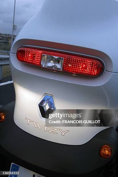 The back of a new Renault electric car Twizy Z.E is pictured on December 20, 2011 at the Ile Séguin test centre for electric vehicles in...