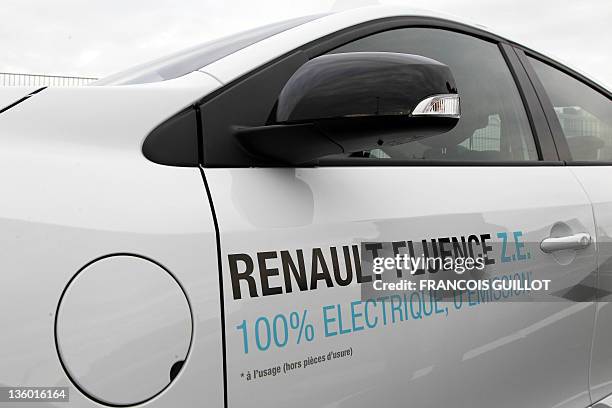 New Renault electric car Fluence Z.E is at a standstill on a test track, on December 20, 2011 at the Ile Séguin test centre for electric vehicles in...