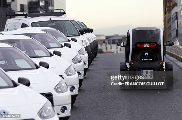 New Renault electric car Twizy Z.E is pictured on a test track, on December 20, 2011 at the Ile Séguin test centre for electric vehicles in...