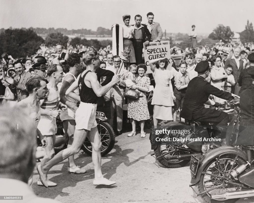 Olympic torch arrives at Wembley Stadium, London, 1948