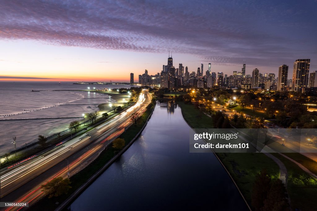 Aerial view of cityscape and Lake Michigan at sunrise, Chicago, Illinois, USA