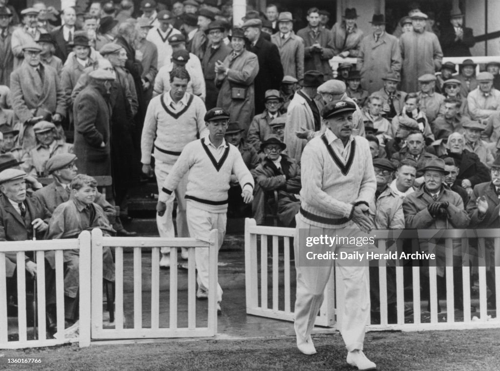 Donald Bradman leads the Australian Cricket Team out onto the field at Worcester, 1948
