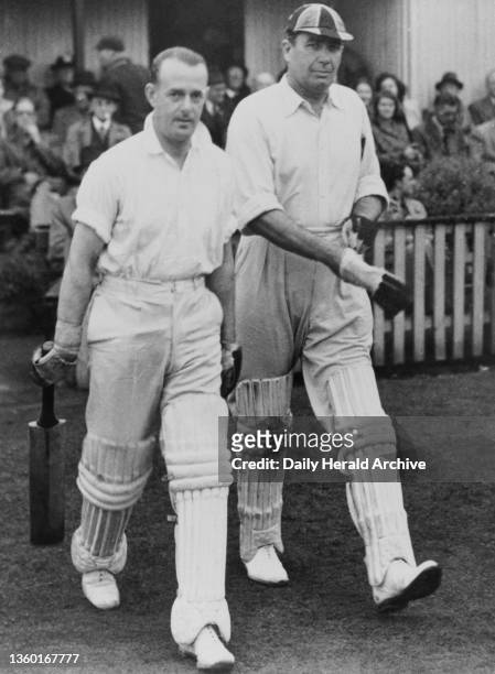 Cricket critics play a charity match at the Didsbury Cricket Club, 1948 R-L, E W Swanton of the BBC and John Kay of the Manchester Evening News open...