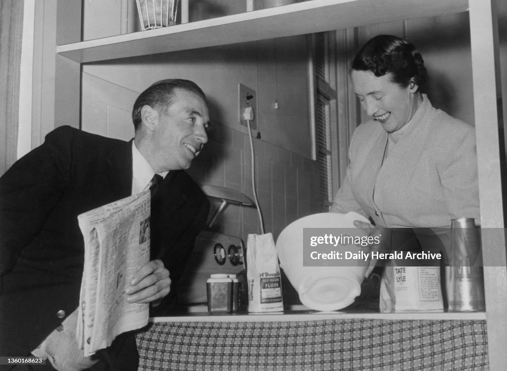 Stanley Matthews at home with his wife, 1957