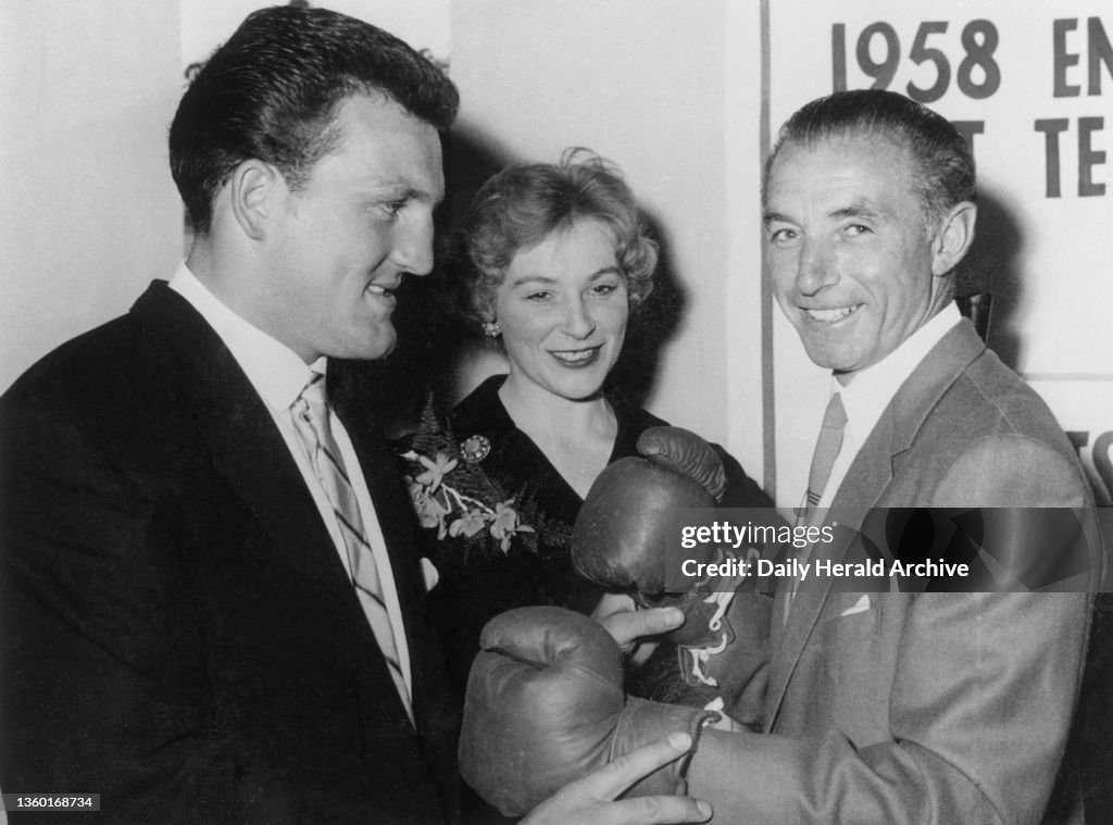 Stanley Matthews at The Stanley Matthews sports exhibition with Sheila Wilcox, Britain's leading horsewoman, and Brian London, Heavyweight boxer, 1958