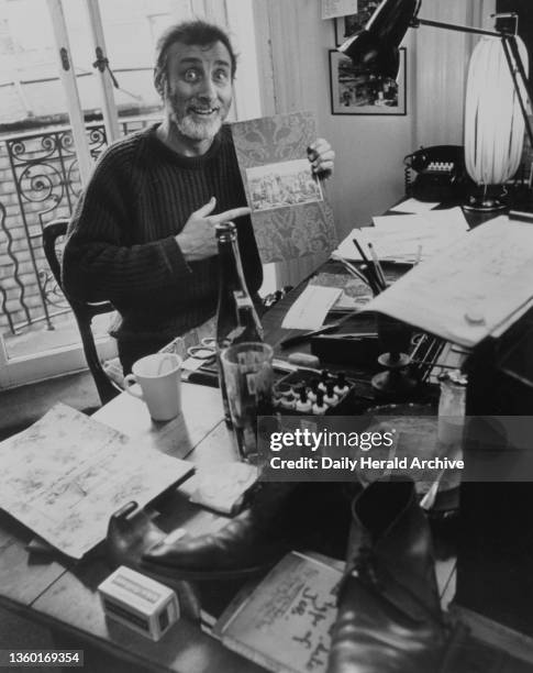 Spike Milligan compiling his new book, 1965.