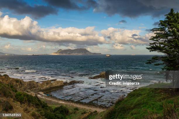 rock of gibraltar viewed from spanish coast, algeciras, cadiz, andalusia, spain - algeciras stock pictures, royalty-free photos & images