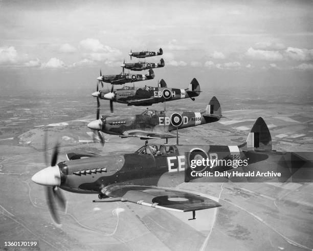 Spitfires in flight, circa 1940s. The Spitfire was designed by Reginald Mitchell and developed from a racing seaplane, the Supermarine S6B, which won...