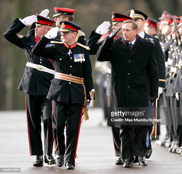 Director David Petraeus, accompanied by Major General Patrick Marriott , inspects the Officer Cadets as he represents Britain's Queen Elizabeth II at...