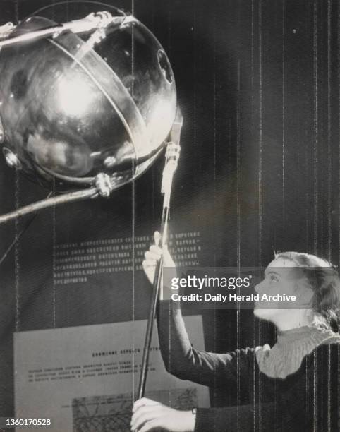 Sputnik I on show. 13th November 1957. Moscow, Russia. With its antennas jutting out, a replica of the first Sputnik- Russian artificial Earth...