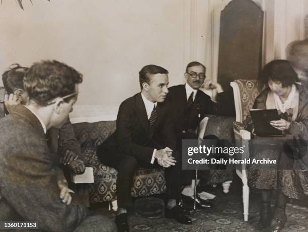 Charlie Chaplin being interviewed at the Ritz Hotel, London. 1921