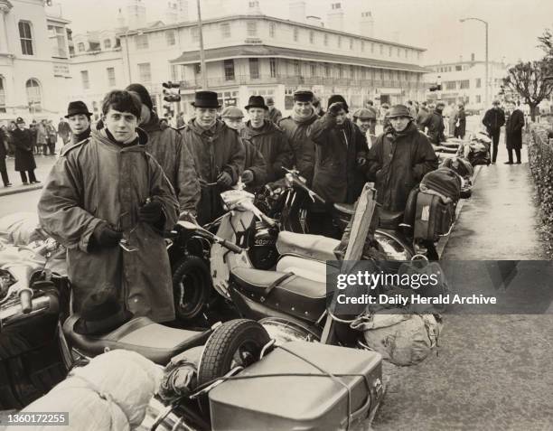 Photograph of a group of Mods near the seafront at Clacton-on-Sea, Essex on 30 March 1964. 100 arrests were made over the Easter weekend of 27th-30th...