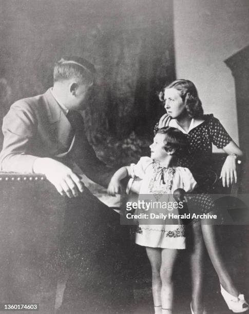 Adolf Hitler and Eva Braun , circa 1945. 'Eva's personal album contained dozens of pictures of herself and Hitler in 'family poses', with a...