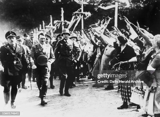 Adolf Hitler with members of the German armed forces attending the great harvest festival at Goslar. 700,000 peasants from all over Germany attended...