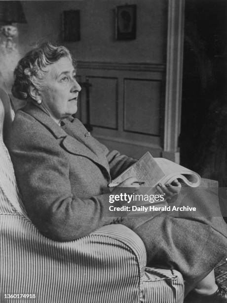 Agatha Christie, English crime writer, 9 March 1946. Agatha Christie correcting the proofs of her latest book. A photograph taken in her study at...