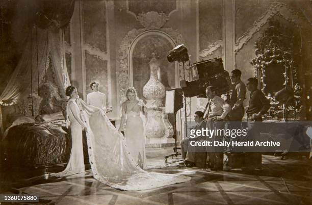 Bedchamber scene in The Queen later known as Victoria The Great being directed by Herbert Wilcox at the British Dominion Studios in Borehamwood. Anna...