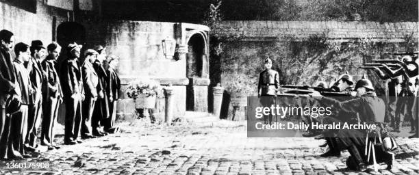 Belgian soldiers found without uniforms on in front of a firing squad, WWI. 'This is a fate that every secret agent risks - death before a firing...