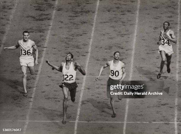 The finish of the men's 400 metres at the Olympics, London, 1948. Arthur Wint of Jamacia winning the 400 metres final at the 1948 Olympics, with Herb...