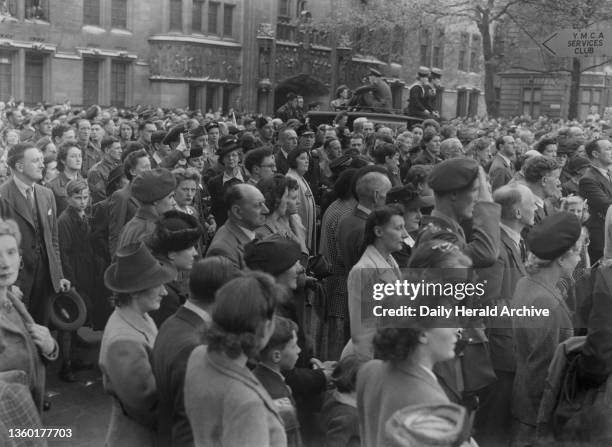 Crowds celebrate V E Day in Westminster, 8 May 1945. Photograph by F Greaves.