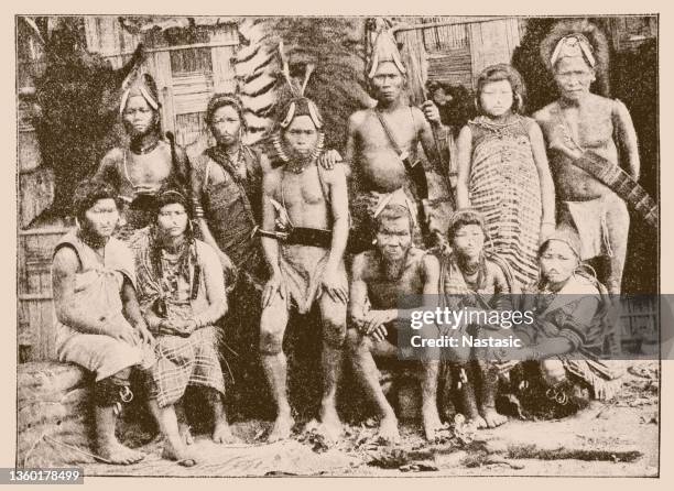 naga warriors in assam. members of the tribe naga. the naga are a mongoloid, tibeto-burman speaking mountain tribe in northeastern india and in the neighboring burma - india tribal people stock illustrations