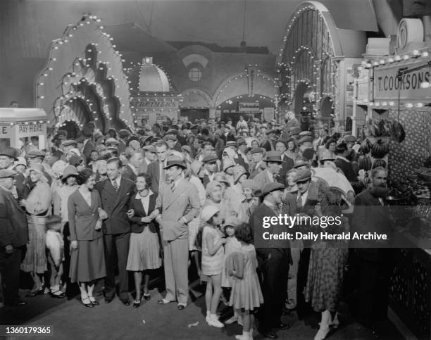 Filming at Gaumont Studios, 2 June 1931. The picture is of a crowd scene taken on a set meant to represent Blackpool. Photograph by Leslie Cardew.