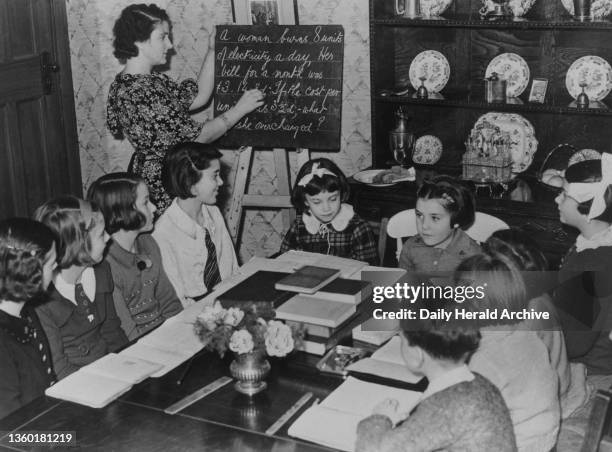 Home schooling, Mrs Renee O'Neill of Alexandra Park, North London, runs a school at her own home. The school was set up when Patricia, her eldest,...