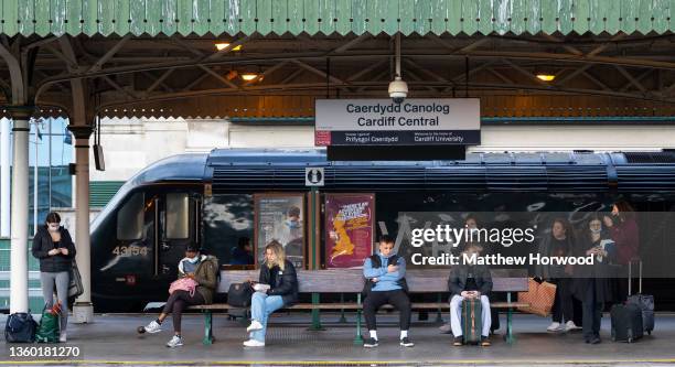 People wait on a platform at Cardiff Central train station on November 12, 2021 in Cardiff, Wales.