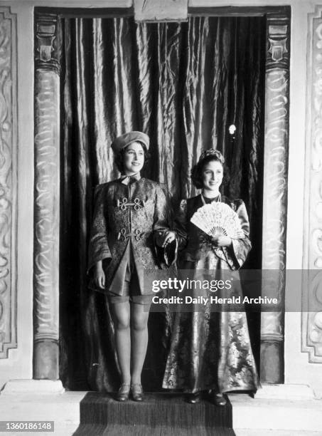 Princess Elizabeth, the future Queen , with her sister Princess Margaret in the pantomime ‘Aladdin’ at Windsor Castle during Christmas 1943. "